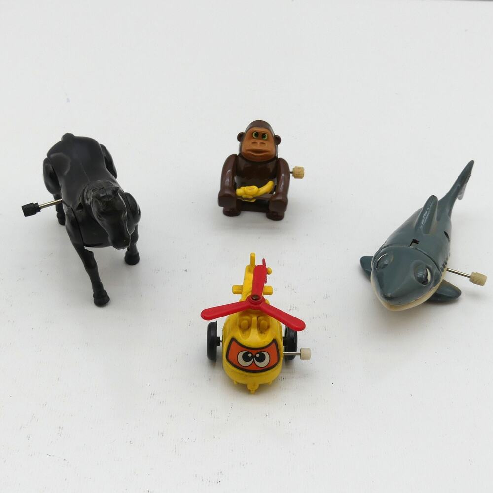 Lot of 4 Vintage Wind Up Toys Horse Monkey Shark Helicopter Plastic Toy Set